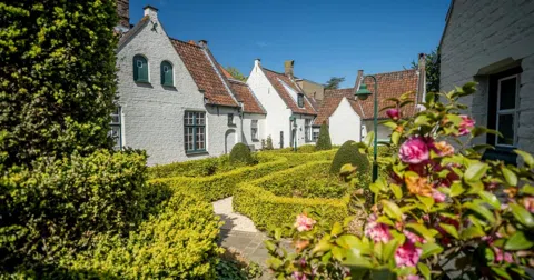 Bruges' Hidden Godshuizen: The Medieval Almshouses Still Lived In Today